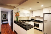 The kitchen comes with a large refrigerator, own, microwave and cooking stoves